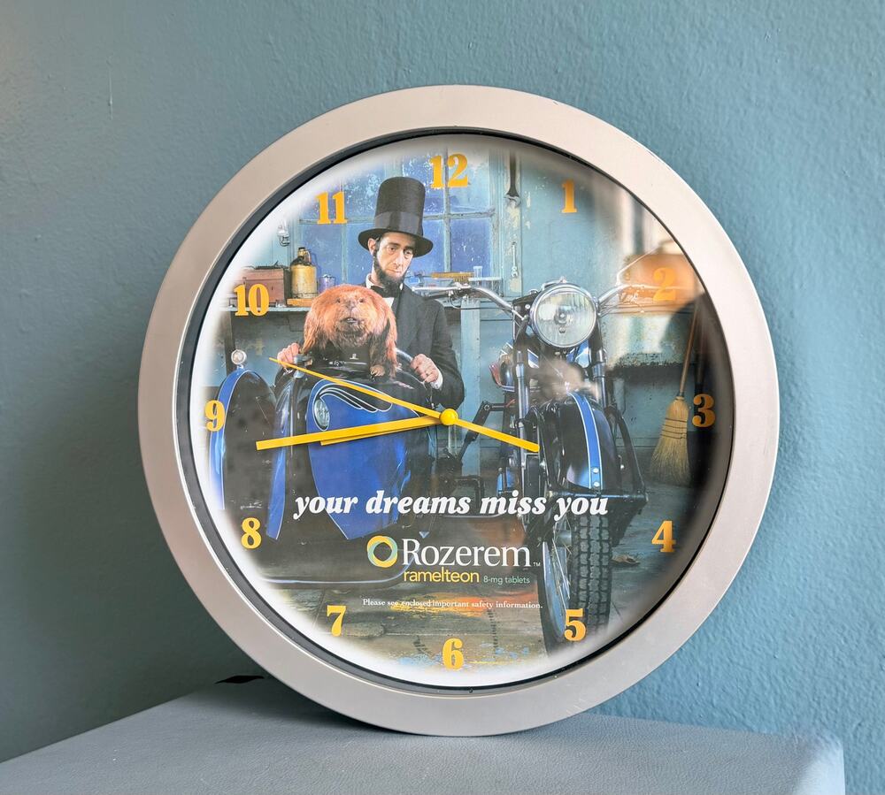 Vintage Rozerem Pharma Promo Clock 12" Abe Lincoln Beaver Motorcycle Wall Decor